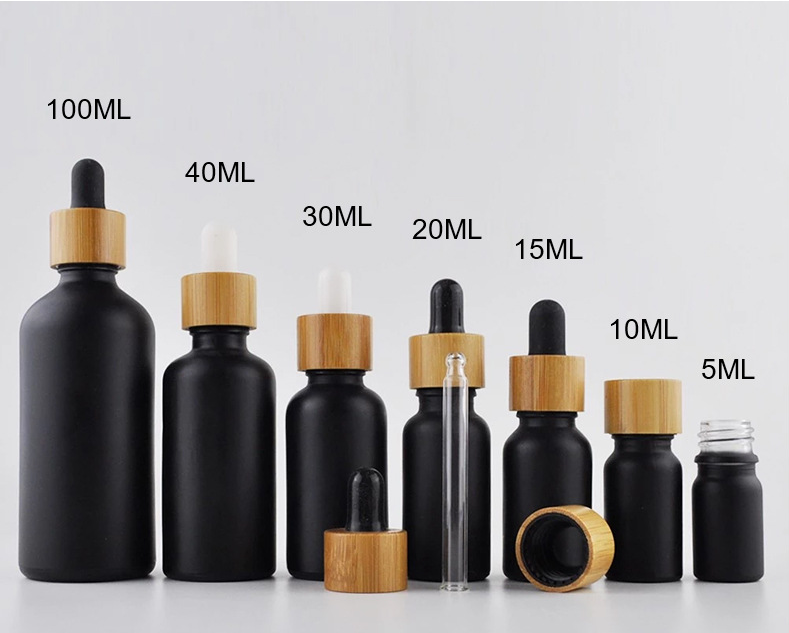 Black Color Coating For Glass Bottle Essential Oil Bottle With Wood Cap For Sale