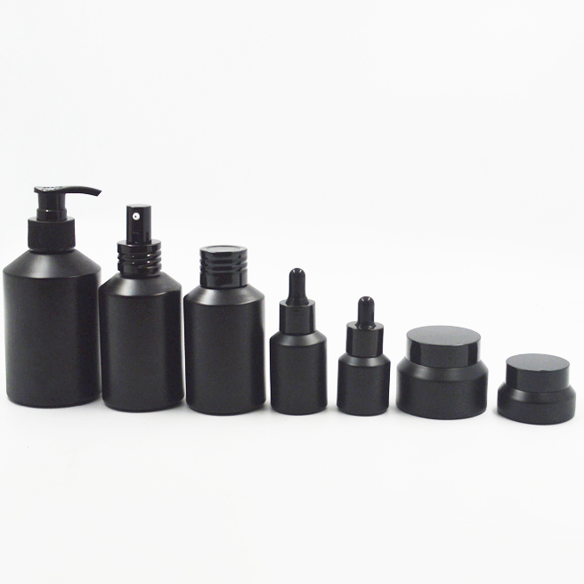 Black Oblique Cosmetic Glass Bottle and Glass Jar with Black Lid and Pump