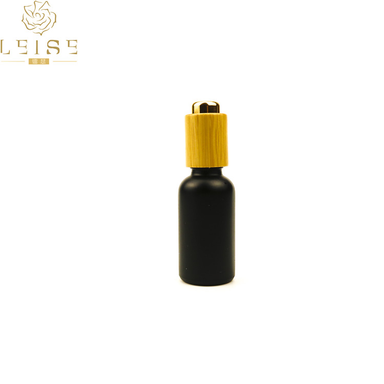 Black frosted glass dropper bottle 20ml 50ml 100ml 60ml 2oz 1oz 30ml matt black glass dropper essential oil bottle bamboo cap