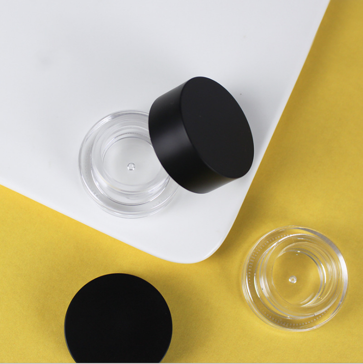 Black matte swivel lid transparent bottom monochrome eye shadow cream box lip mask box lip balm box travel bottle