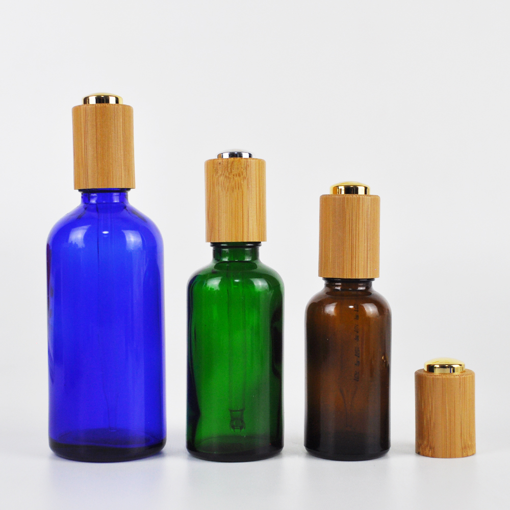 Blue amber clear white 30ml glass oil pipette dropper bottle with bamboo pressure pump cap for essential oil