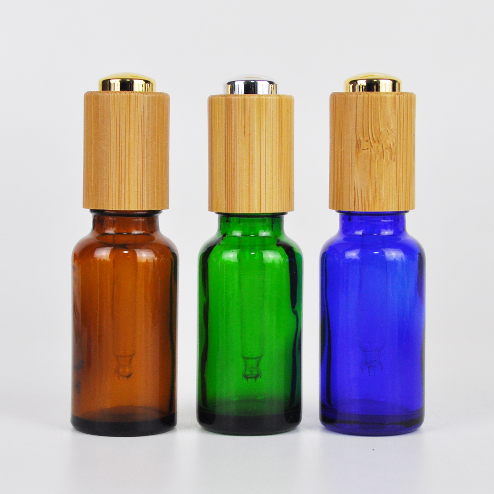 Blue amber clear white 30ml glass oil pipette dropper bottle with bamboo pressure pump cap for essential oil
