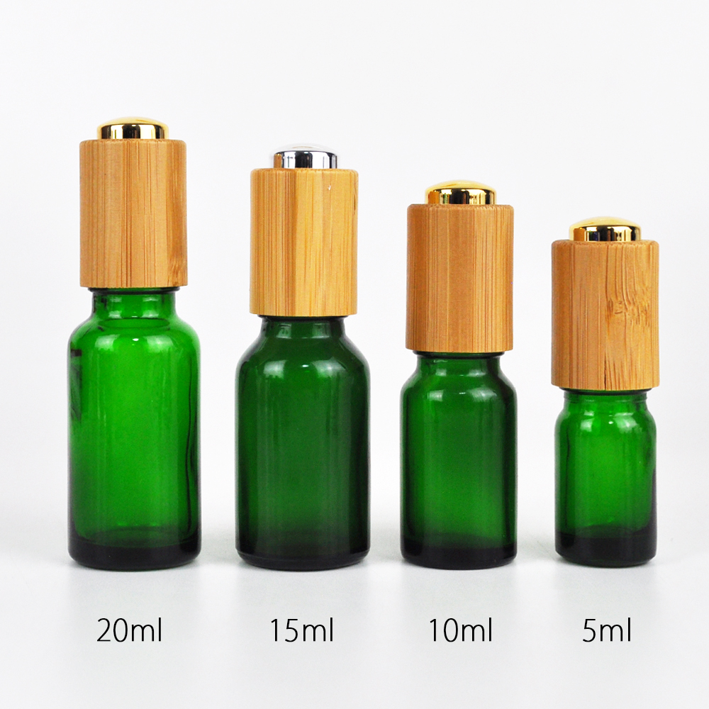 Blue amber clear white 30ml glass oil pipette dropper bottle with bamboo pressure pump cap for essential oil
