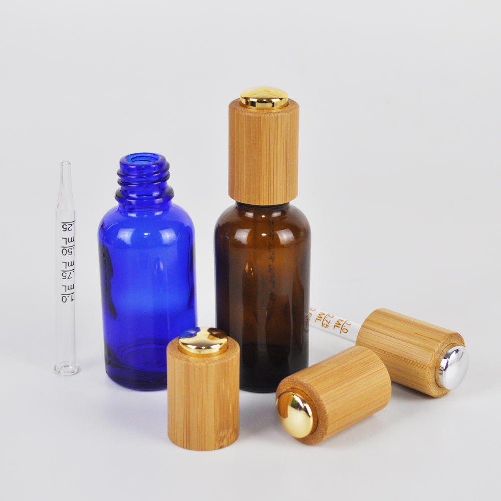 Blue amber clear white 30ml glass oil pipette dropper bottle with bamboo pressure pump cap for essential oil