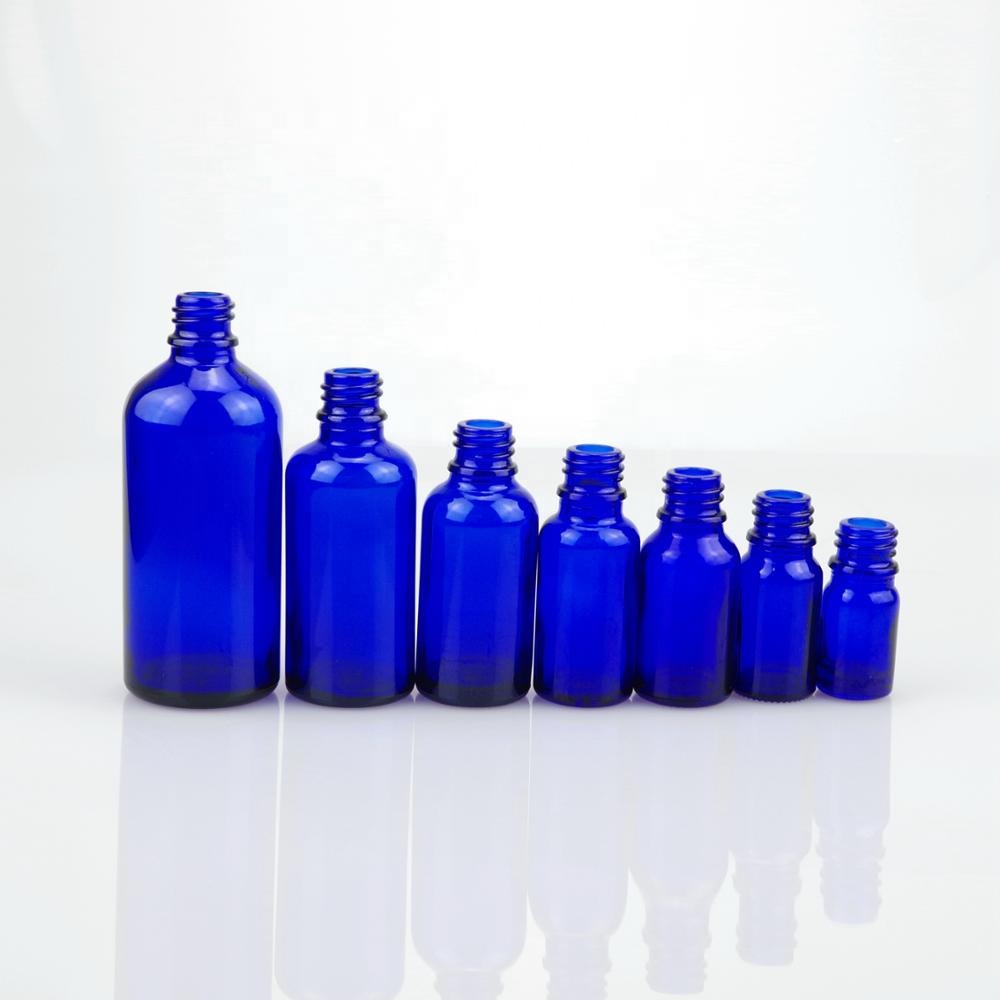 Blue color glass dispensing essential oil bottle with 18/415 TE tamper proof cap