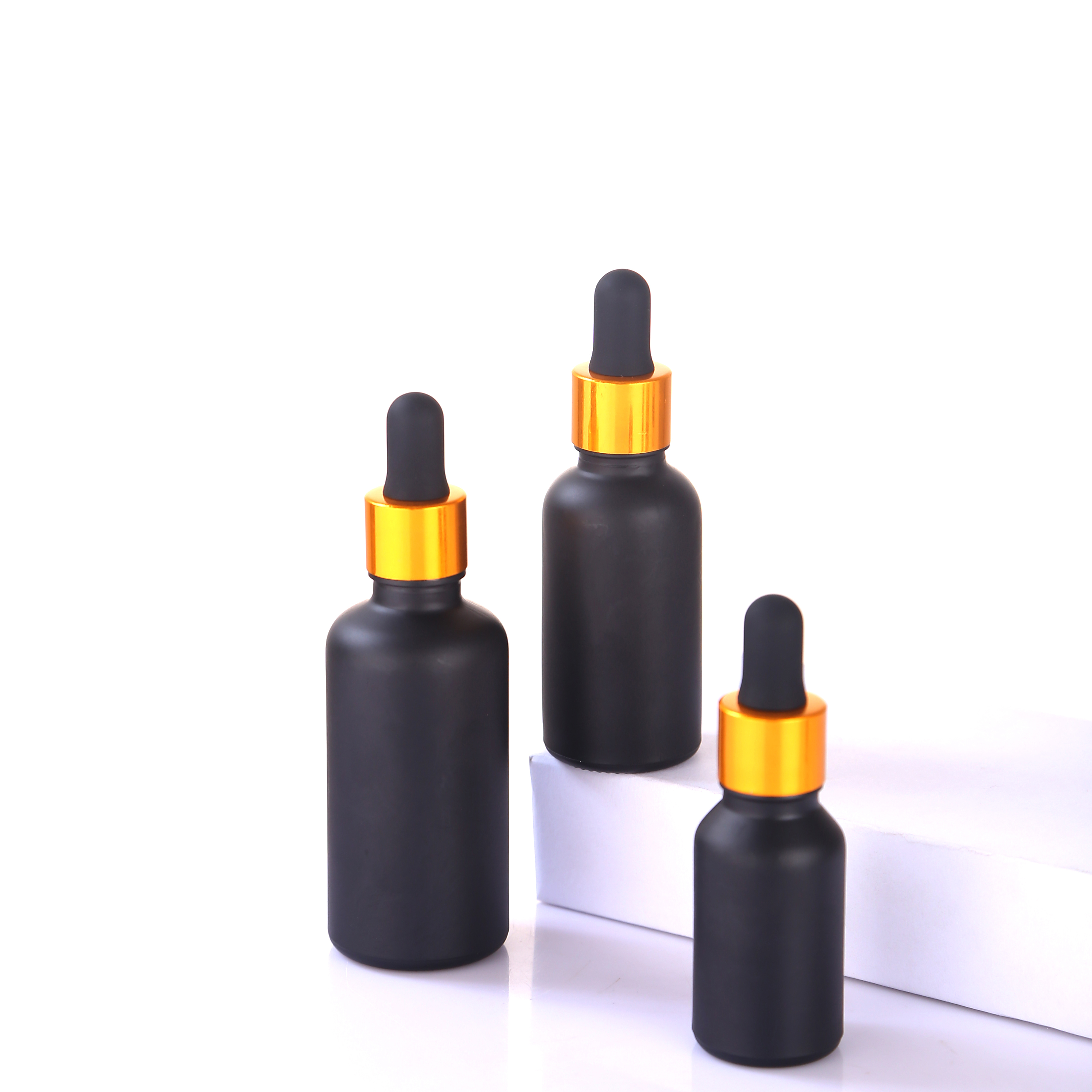 Bottle for sale luxury cosmetic packaging 1oz gold serum dropper bottle matte frosted black glass bottles with gold aluminum cap