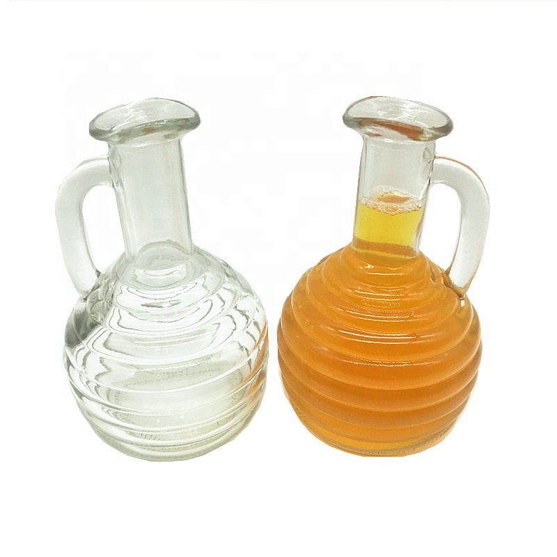 Bpa free empty 270ml glass bottle with small handle for cold pressed juice milk water honey