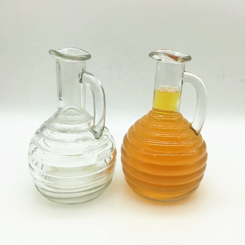 Bpa free empty 270ml glass bottle with small handle for cold pressed juice milk water honey