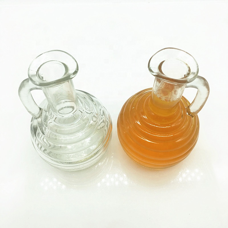 Bpa free empty 270ml glass bottle with small handle for cold pressed juice milk water honey