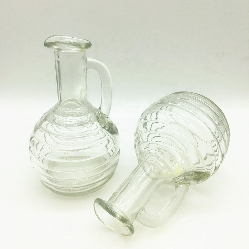 Bpa free empty 270ml glass bottle with small handle for cold pressed juice milk water honey