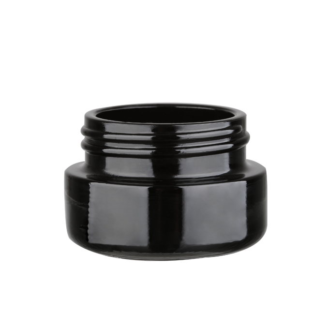 Bright black glass cream jar