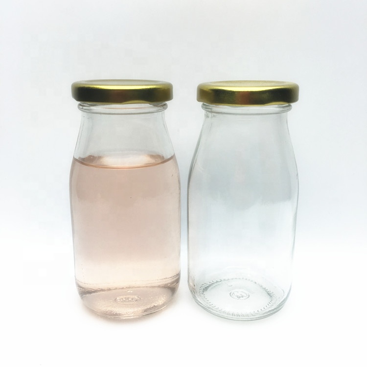 Bulk 200ml clear glass coconut milk almond milk bottle with metal cap
