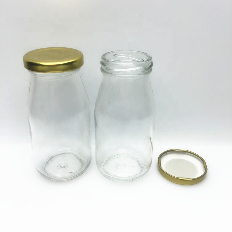 Bulk 200ml clear glass coconut milk almond milk bottle with metal cap