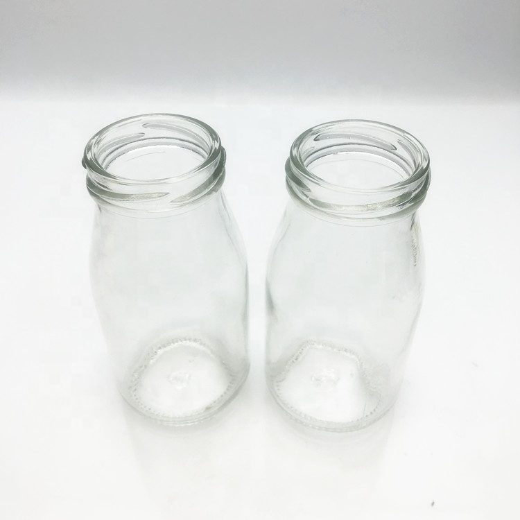 Bulk 200ml clear glass coconut milk almond milk bottle with metal cap