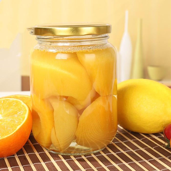 Canned glass round bottle with an empty lid can be steamed high temperature resistant fruit yellow peach sealed canned