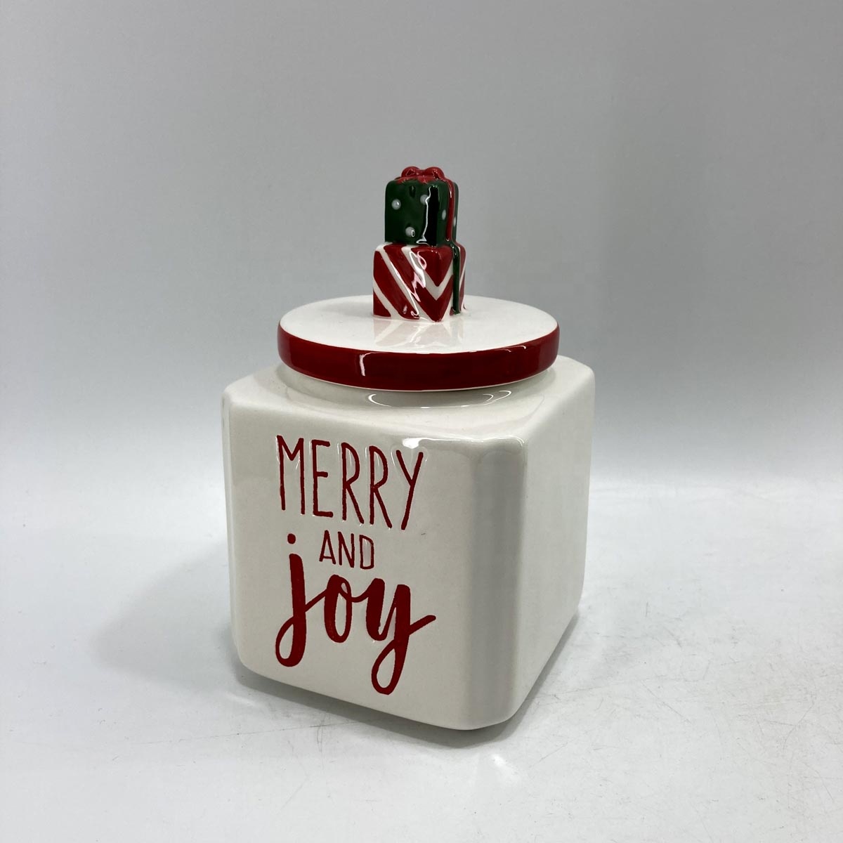 Ceramic storage jar with snowman lid