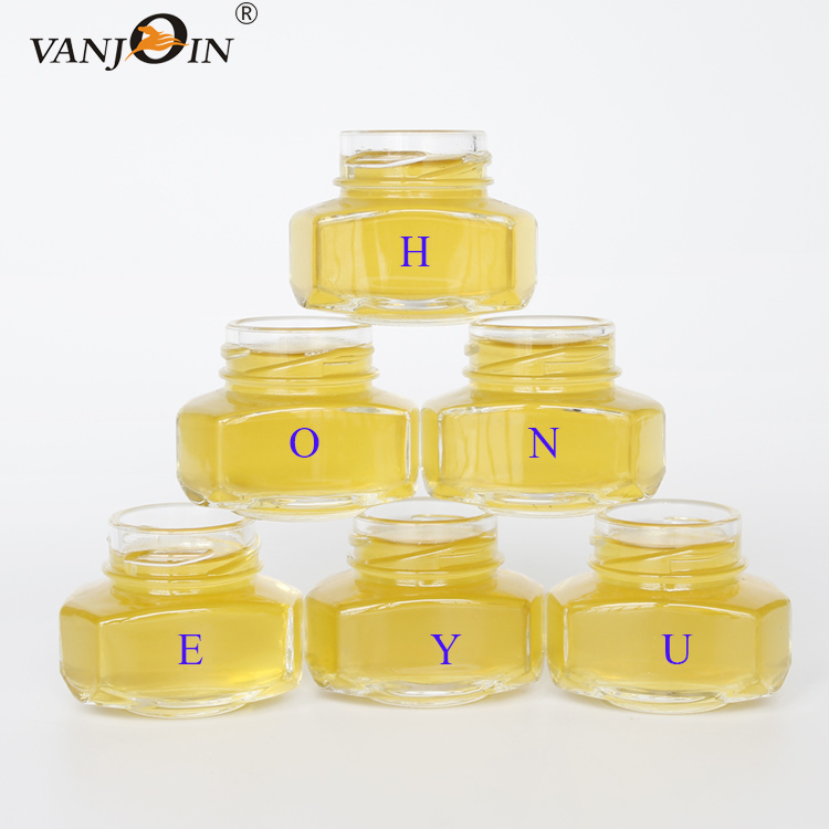 Cheap Clear 60g 150g 250g 380g 520g gram honey jars Oval Hex Jam Glass Jar With Screw Lid For Honey Jelly Candy for sale