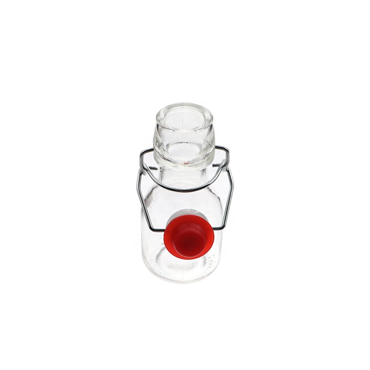 Cheap Round 60 ml 2oz Empty Glass Bottles With Caps Beverage Juice Bottle