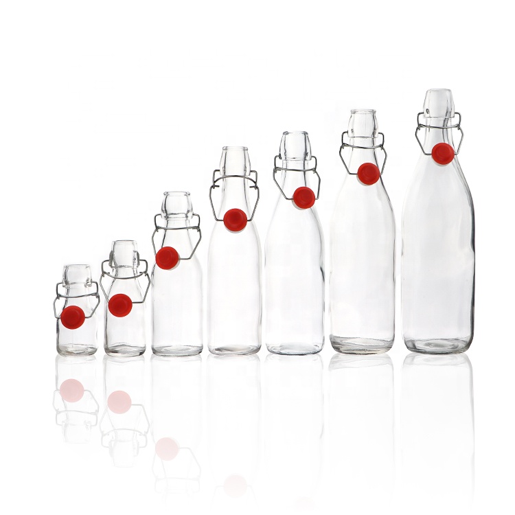 Cheap Round 60 ml 2oz Empty Glass Bottles With Caps Beverage Juice Bottle