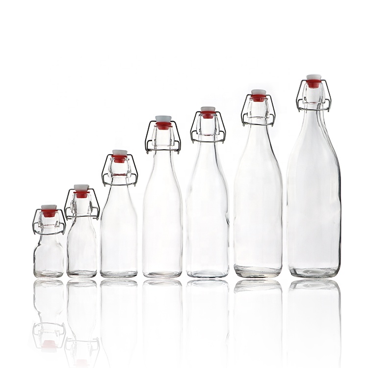 Cheap Round 60 ml 2oz Empty Glass Bottles With Caps Beverage Juice Bottle
