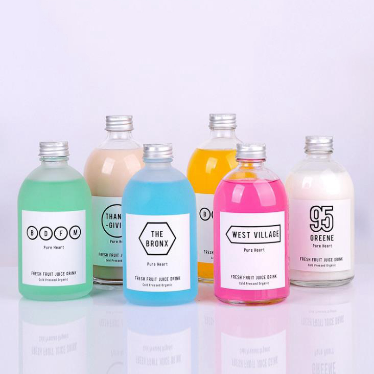 Cheap discount cold press juice bottle drink bottle logo custom, glass drink bottles