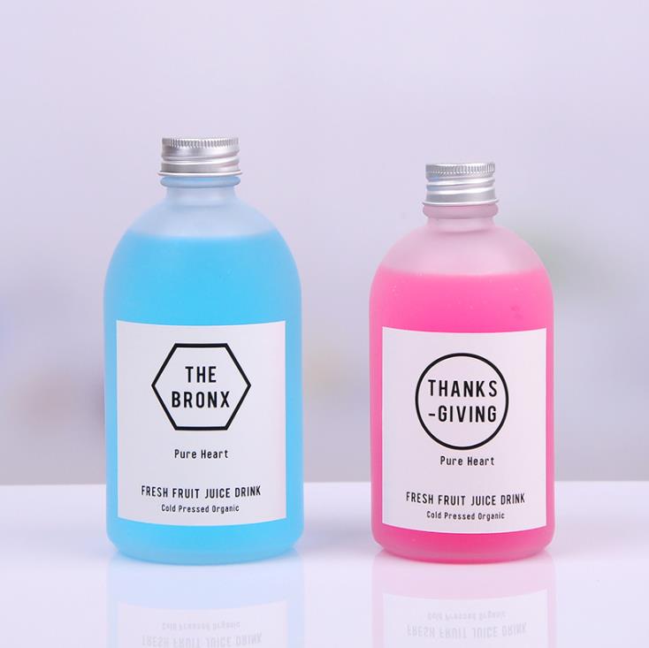 Cheap discount cold press juice bottle drink bottle logo custom, glass drink bottles