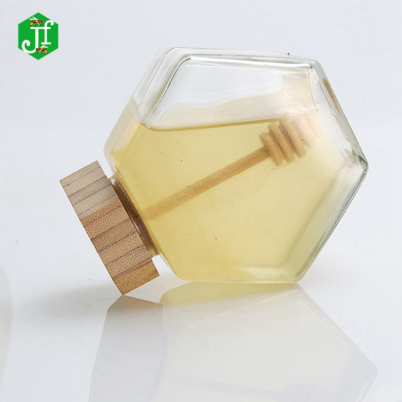 Cheap hot sale bee honey glass jar with lid, little honey glass jar