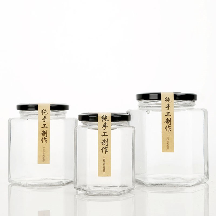 Cheap price 730ml 500ml 380ml 280ml 180ml hexagonal glass storage jar with metal lids wholesale