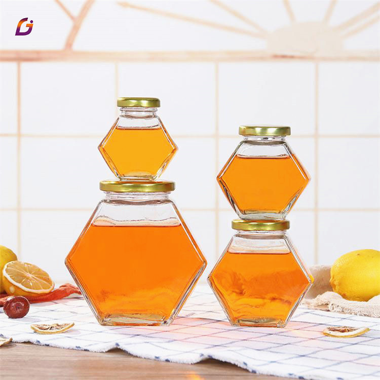 Cheap price bee honey jar glass hexagon shape 100ml 180ml 280ml 380ml