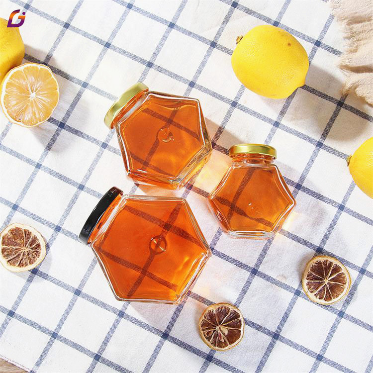 Cheap price bee honey jar glass hexagon shape 100ml 180ml 280ml 380ml