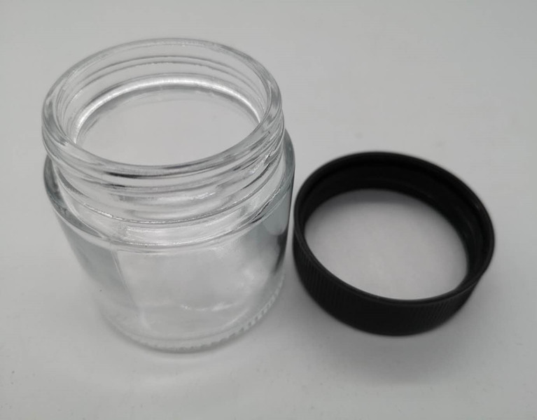 Childproof glass jars 60ml 2oz CBD bottle glass jar with child proof lid child resistant glass jar