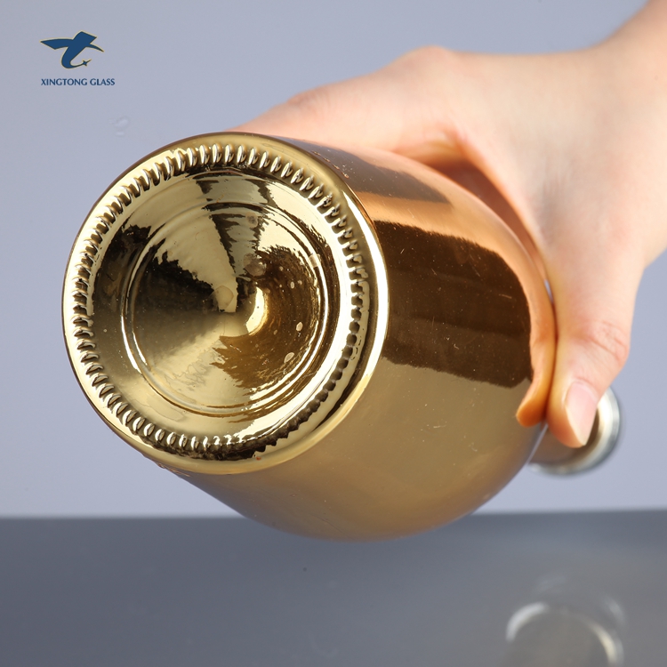 China Factory Custom Gold Champagne Glass Bottles With Plastic Cap