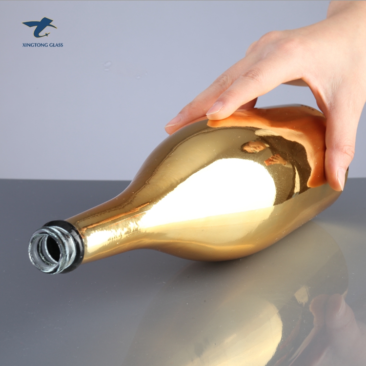 China Factory Custom Gold Champagne Glass Bottles With Plastic Cap