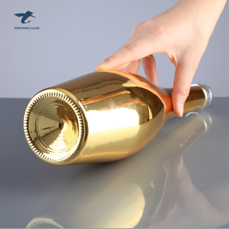 China Factory Custom Gold Champagne Glass Bottles With Plastic Cap