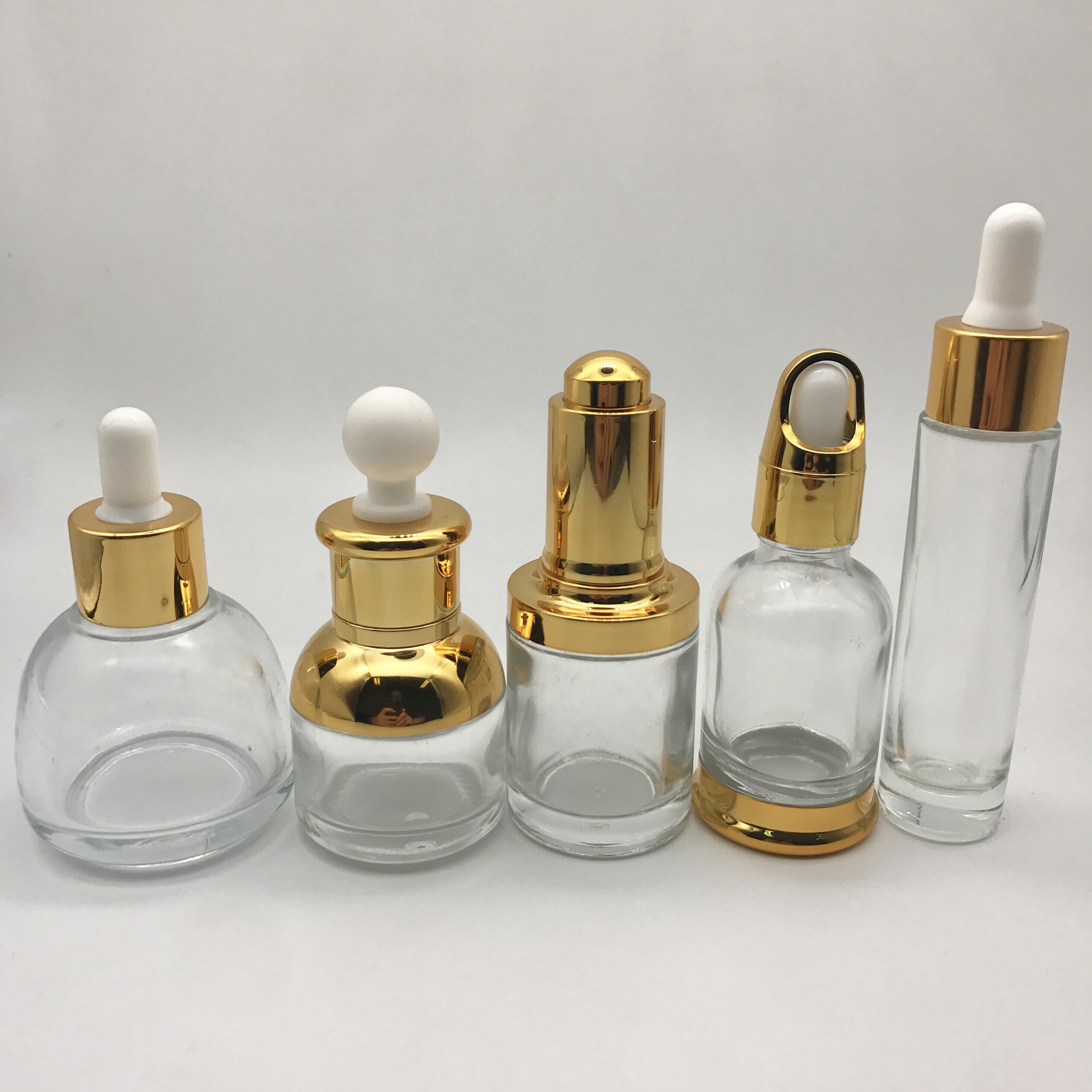 China Factory Electric Glass Dropper Bottle 10ml 15ml 30ml 50ml Golden Collar Dropper Bottle