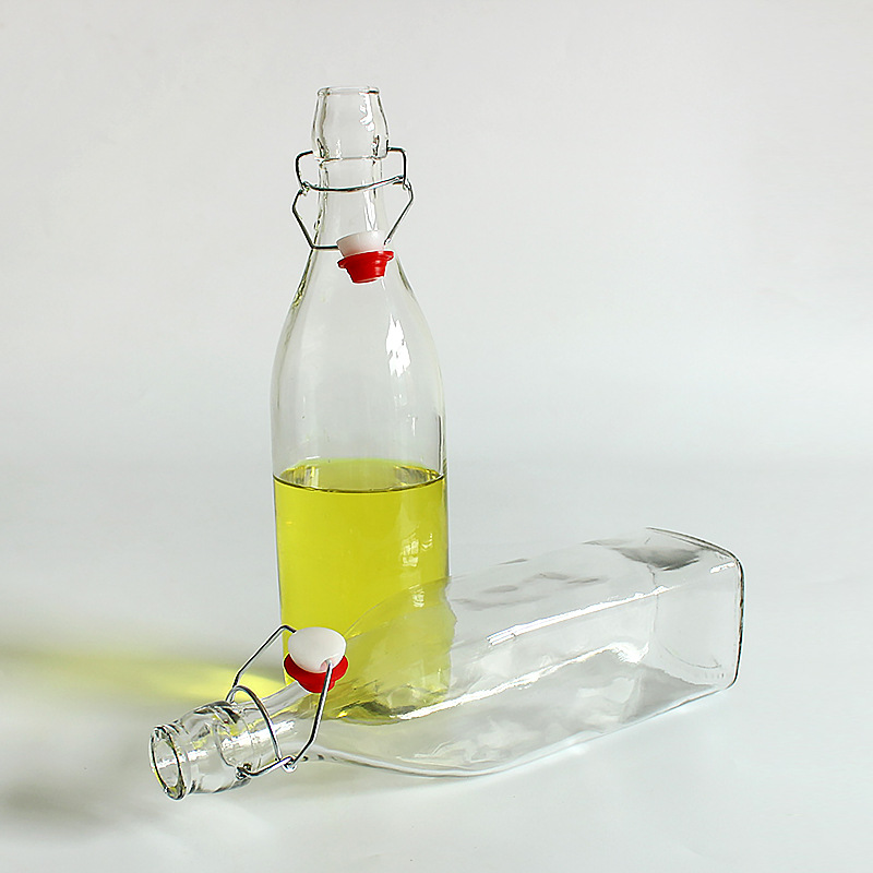 China Factory Export Product Swing Clip Top Clear Sealed Glass Beverage Storage Bottles