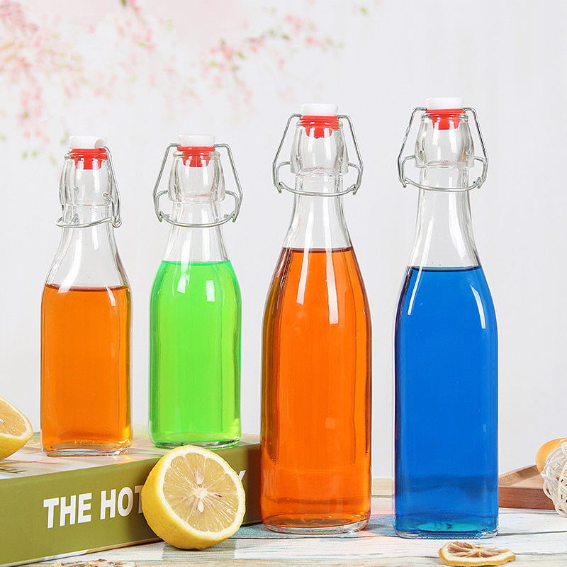 China Factory Export Product Swing Clip Top Clear Sealed Glass Beverage Storage Bottles