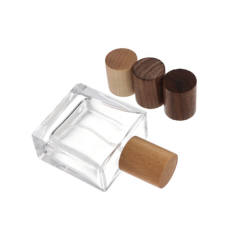 China Manufacture Customized Wooden Cap 30ml 50ml 100ml Glass Perfume Bottle With Spray Cap