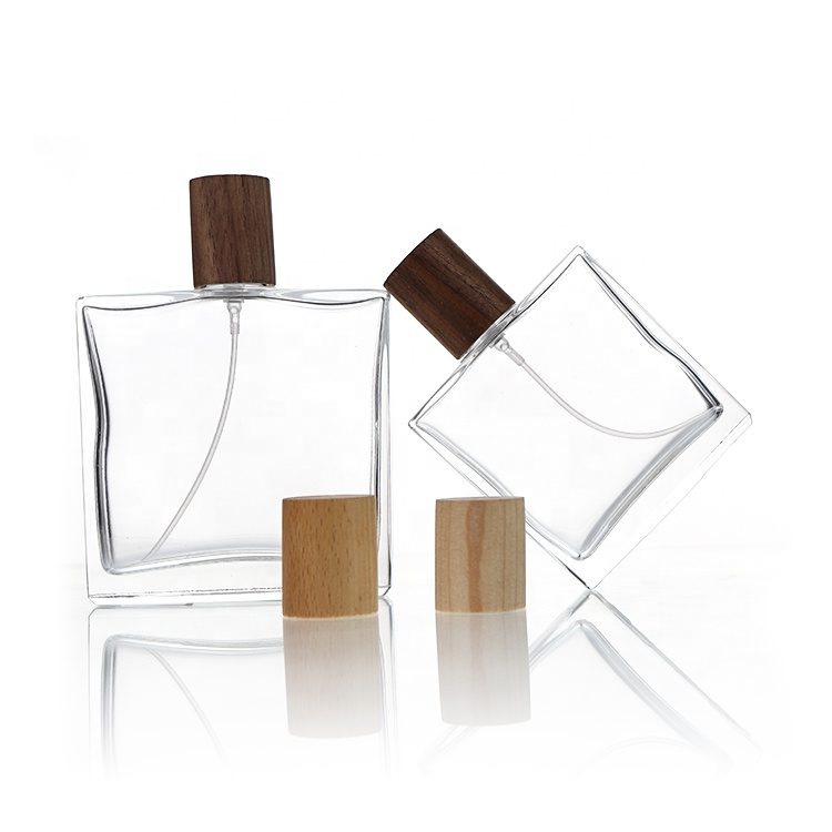 China Manufacture Wooden Caps Luxury Glass Perfume Bottle 50ml 100ml Perfume Glass Bottle