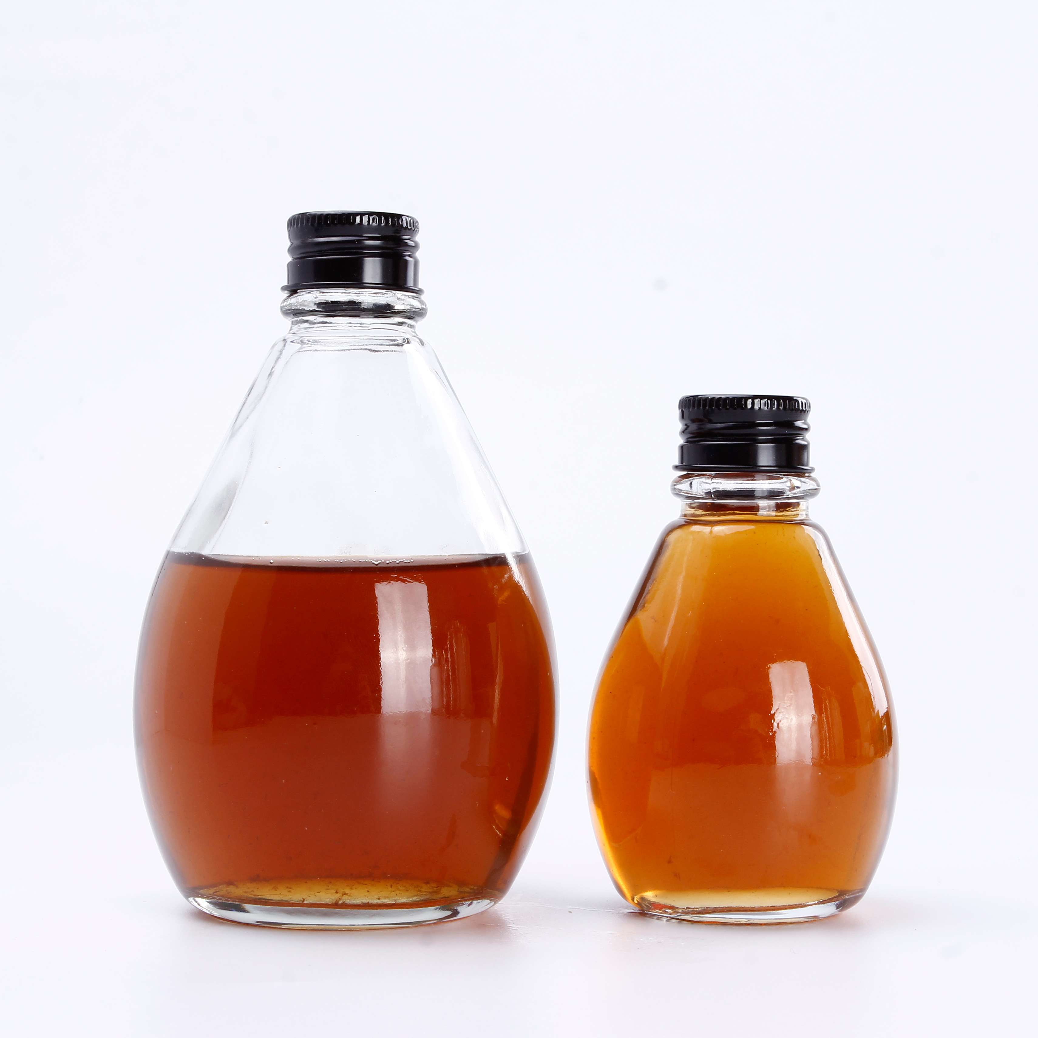 China Manufacturers Sales Clear 350ml Glass Juice Bottles Glass Bottle for Honey