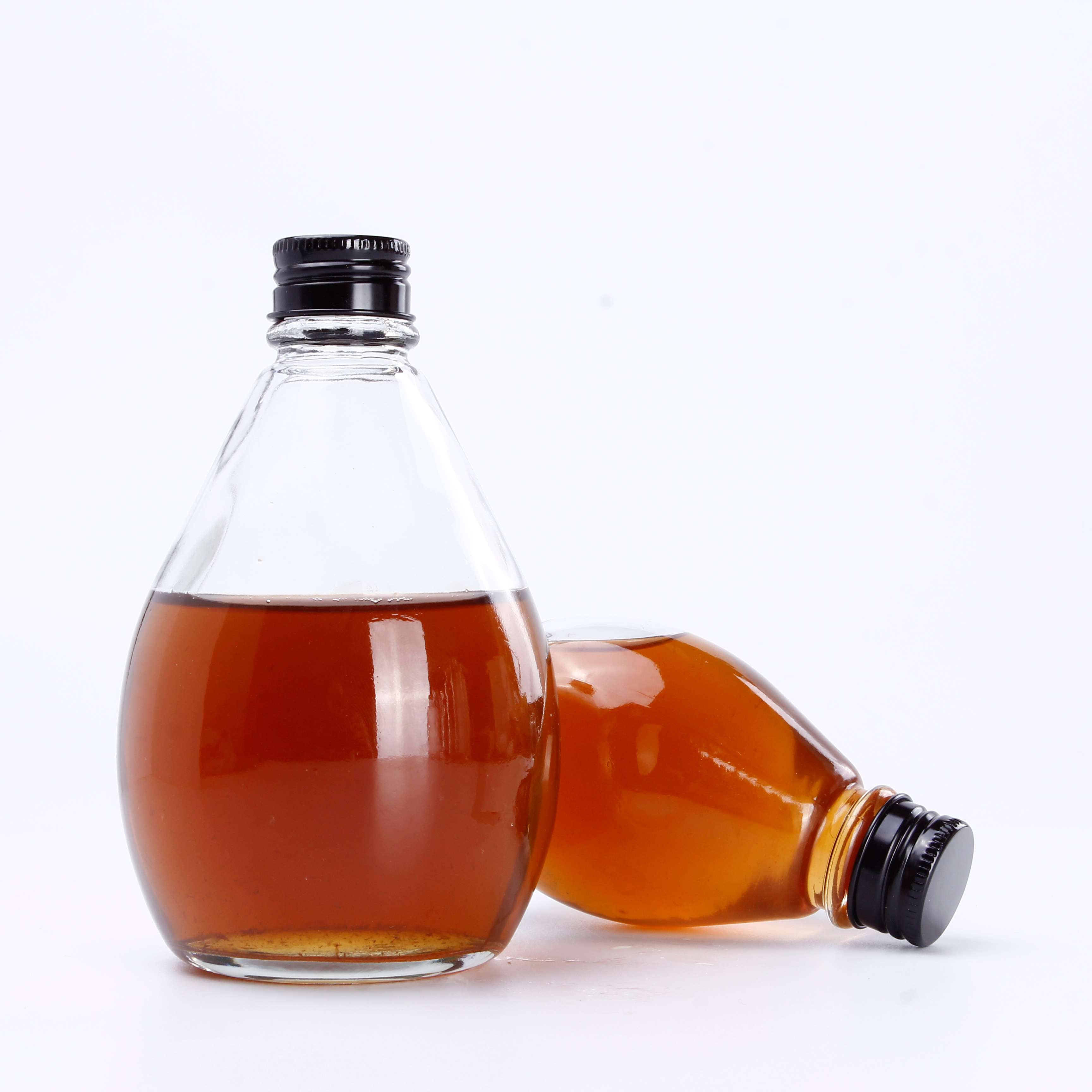 China Manufacturers Sales Clear 350ml Glass Juice Bottles Glass Bottle for Honey