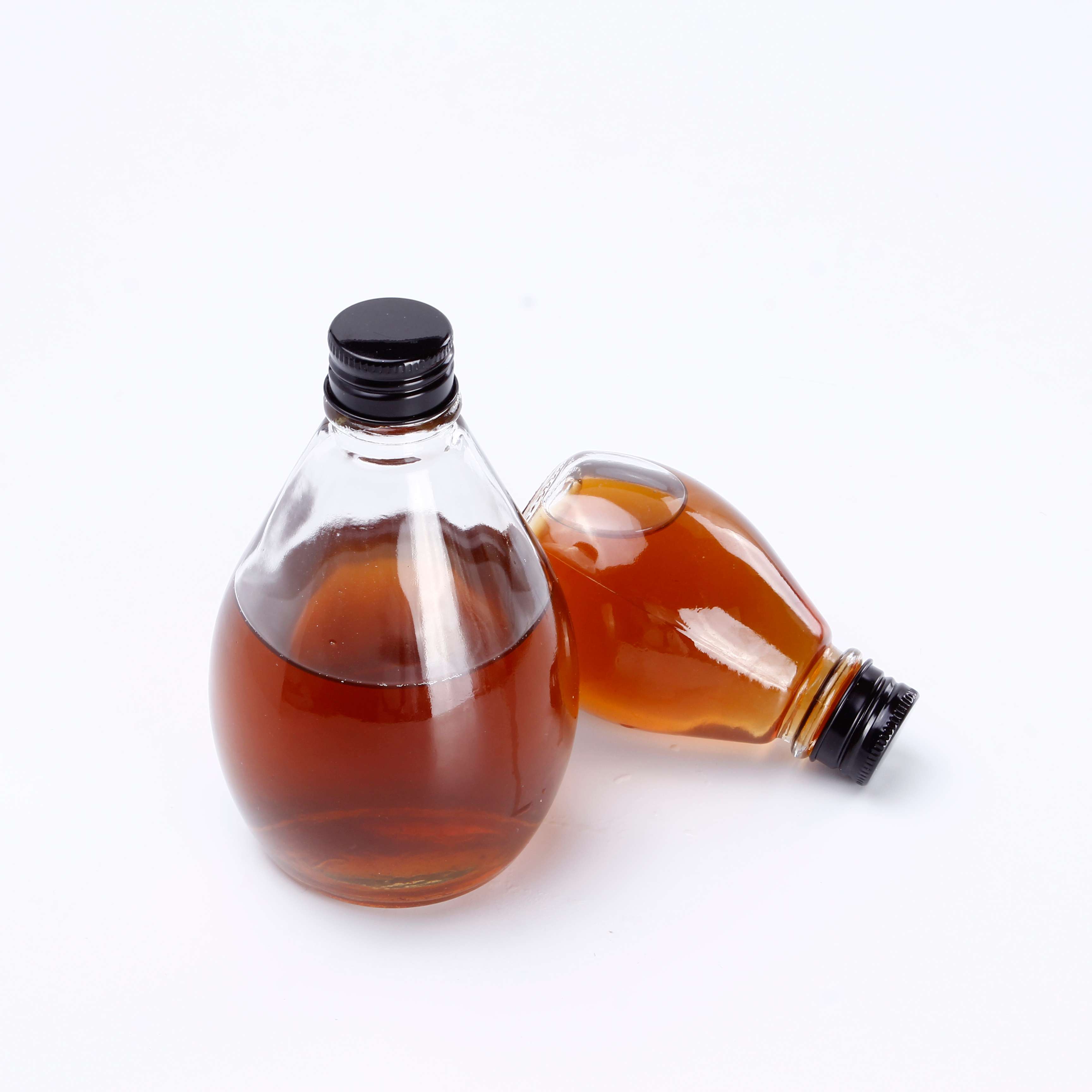 China Manufacturers Sales Clear 350ml Glass Juice Bottles Glass Bottle for Honey