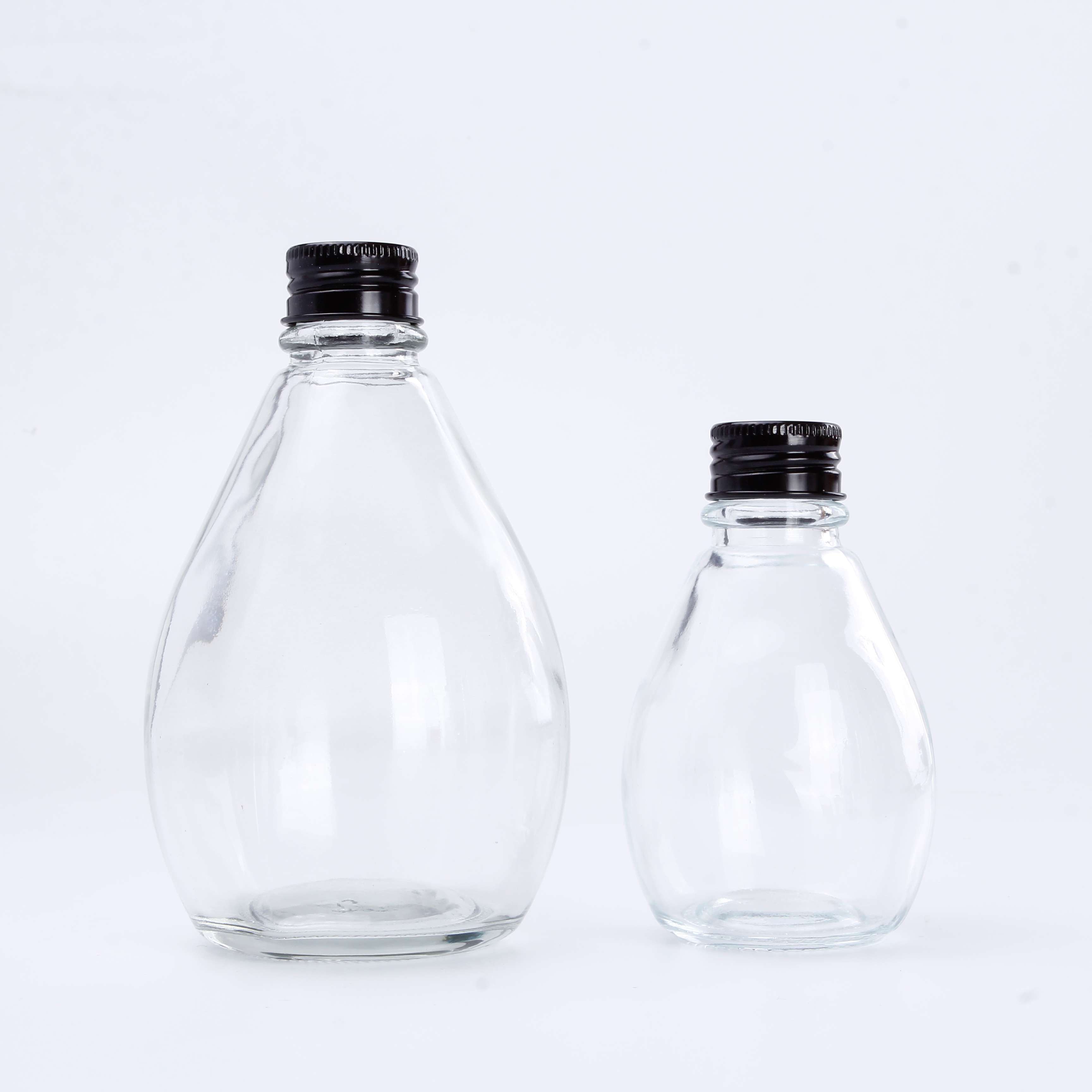 China Manufacturers Sales Clear 350ml Glass Juice Bottles Glass Bottle for Honey