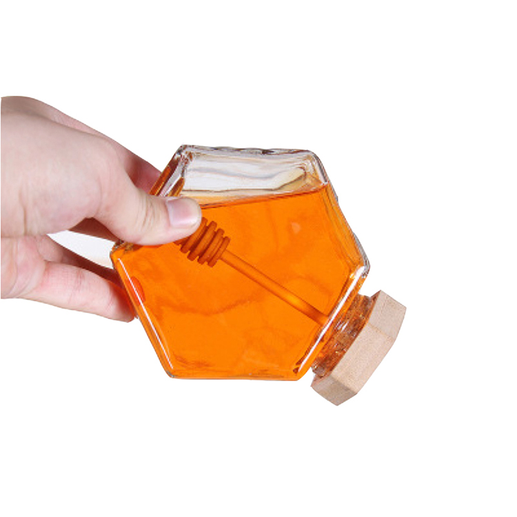 China RTCO Manufacturer 100ml 220ml 380ml 500g Transparent Glass Honey Jar Jam Bottle With Wooden Lid Hexagon Honey Container