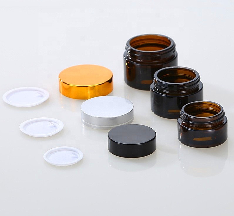 China best supplier pretty round brown glass jars 2oz glass jars with lids