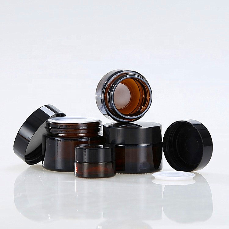 China best supplier pretty round brown glass jars 2oz glass jars with lids