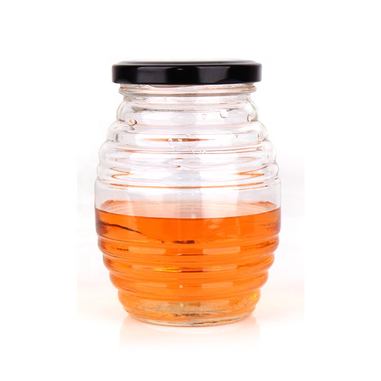 China factory empty unique 380ml clear  honey glass jar with black metal lid