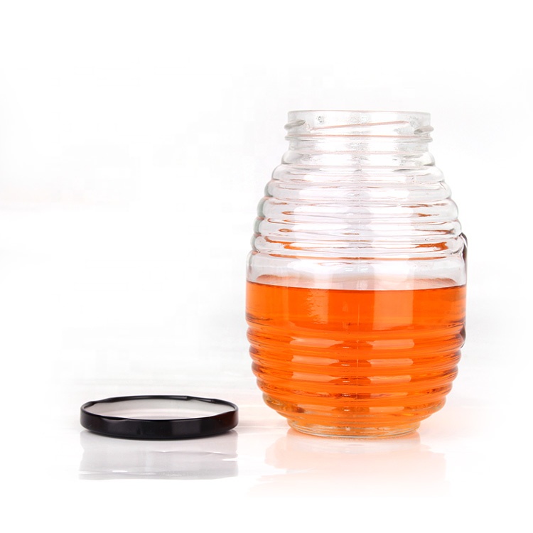 China factory empty unique 380ml clear honey glass jar with black metal lid