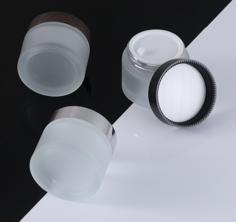 China factory wholesale custom made cosmetic fancy glass jars and lids