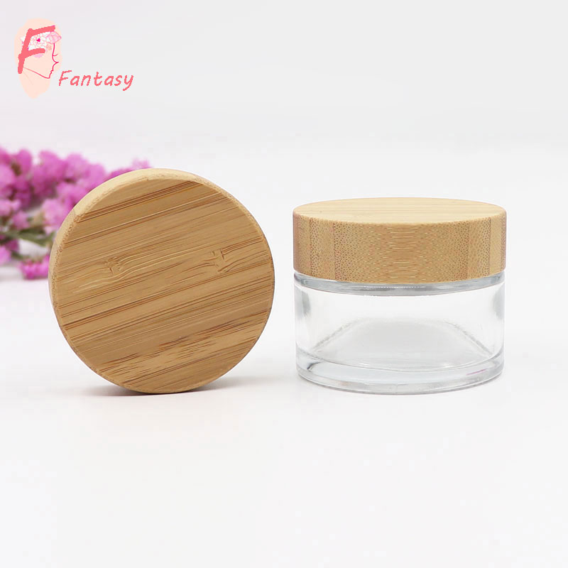 China high end clear frosted glass cream jar container bamboo cap luxury glass jar with wood lid 30ml 50ml 100ml
